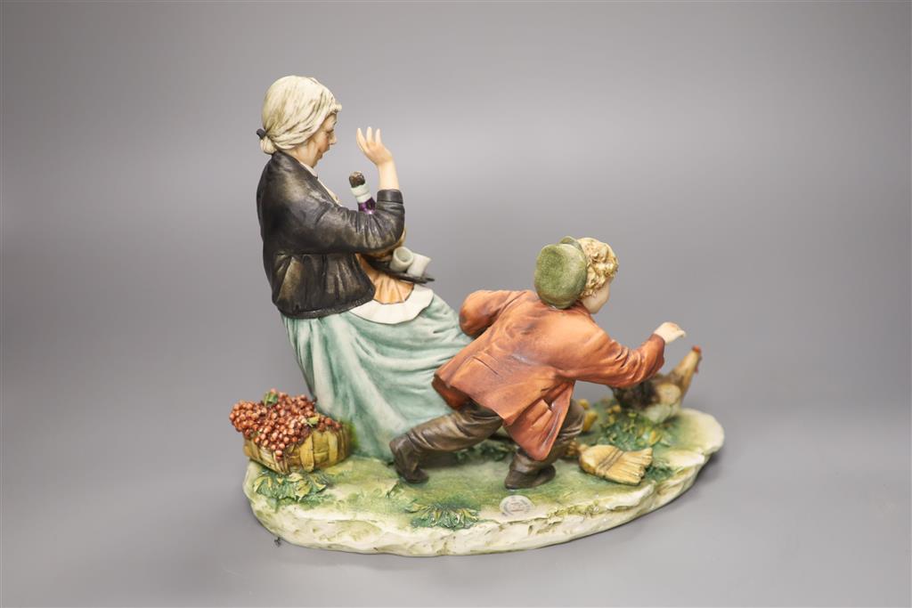 A Capodimonte figure, Excuse me Grandma, height 23cm